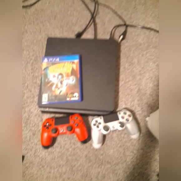 Sony PlayStation 4 Console with Red and White Controllers